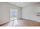 Open dining area with sliding glass doors to backyard and wood-look flooring at 260 Sweet Cherry Ln, Summerville, SC 29486
