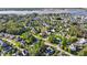 Aerial view of a neighborhood with ponds, lush landscaping, and marsh views at 3011 River Vista Way, Mount Pleasant, SC 29466