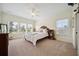 Bedroom featuring neutral carpet, windows for natural light and furniture at 3011 River Vista Way, Mount Pleasant, SC 29466