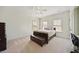 Bedroom with white walls, ceiling fan, and multiple windows offering natural light at 3011 River Vista Way, Mount Pleasant, SC 29466