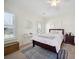 Bedroom with white walls, shutters, ceiling fan, and a doorway to outdoor deck or patio at 3011 River Vista Way, Mount Pleasant, SC 29466