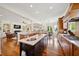Spacious gourmet kitchen with marble countertops, custom cabinetry, and an open layout to the living area at 3011 River Vista Way, Mount Pleasant, SC 29466
