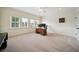 Well-lit office featuring neutral carpet and multiple windows for ample natural light at 3011 River Vista Way, Mount Pleasant, SC 29466
