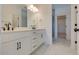 Bathroom featuring a double vanity with quartz countertops, black fixtures, and tile flooring at 3118 Vanessa Lynne Blvd, Johns Island, SC 29455
