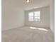 Bright bedroom featuring neutral carpet and a large window at 3118 Vanessa Lynne Blvd, Johns Island, SC 29455