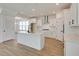 Kitchen showcasing white cabinets, stainless steel appliances, center island, and open access to dining area at 3118 Vanessa Lynne Blvd, Johns Island, SC 29455