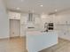 Modern kitchen features white cabinetry, stainless steel appliances, a center island, and beautiful countertops at 3118 Vanessa Lynne Blvd, Johns Island, SC 29455