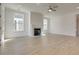 Spacious living room features a fireplace, ceiling fan, and plenty of natural light at 3118 Vanessa Lynne Blvd, Johns Island, SC 29455