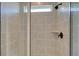Close-up of a tiled shower with glass door and window at 3118 Vanessa Lynne Blvd, Johns Island, SC 29455