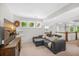 Cozy basement area featuring comfortable seating, natural light, and modern decor at 32 Middleton Oaks Rd, Charleston, SC 29414