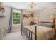 Comfortable bedroom featuring a vintage-style bed and ample natural light at 32 Middleton Oaks Rd, Charleston, SC 29414