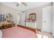 Cozy bedroom featuring a wooden bed frame and charming decor at 32 Middleton Oaks Rd, Charleston, SC 29414