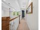 Bright hallway with coffered ceilings, natural light, and white wainscoting at 32 Middleton Oaks Rd, Charleston, SC 29414