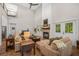 Bright living room with a fireplace, comfortable seating, hardwood floors, and modern decor at 32 Middleton Oaks Rd, Charleston, SC 29414