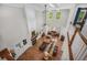 Spacious living room with hardwood floors, fireplace, and large windows for natural light at 32 Middleton Oaks Rd, Charleston, SC 29414