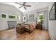 Bright main bedroom with hardwood floors, vaulted ceiling, and plenty of natural light at 32 Middleton Oaks Rd, Charleston, SC 29414
