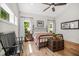 Comfortable main bedroom with vaulted ceiling, hardwood flooring, and windows at 32 Middleton Oaks Rd, Charleston, SC 29414