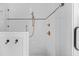 Beautiful white tiled shower with bronze hardware and glass enclosure at 32 Middleton Oaks Rd, Charleston, SC 29414
