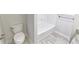 Bathroom view of toilet, bathtub and a partial view of the vanity at 321 Houston Dr, Ladson, SC 29456