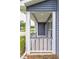 View of covered porch with white pillars at 321 Houston Dr, Ladson, SC 29456