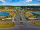 An aerial view of the community entrance featuring manicured landscaping and elegant signage at 331 Fish Creek Ct, Summerville, SC 29486