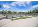 Inviting community amenity space with benches overlooking manicured lawns and neighborhood homes at 331 Fish Creek Ct, Summerville, SC 29486