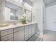 Bright bathroom featuring a double sink vanity with elegant gray cabinetry and quartz countertops at 331 Fish Creek Ct, Summerville, SC 29486