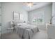Bedroom featuring a plush bed, soft lighting, and large windows at 331 Fish Creek Ct, Summerville, SC 29486