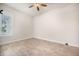 Empty bedroom features wood floors, white walls, and natural light from the shuttered window at 331 Fish Creek Ct, Summerville, SC 29486