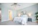 Bright bedroom with a fan boasts natural light and features light blue walls at 331 Fish Creek Ct, Summerville, SC 29486