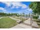 Scenic view of the neighborhood's common area with a lakefront boardwalk and lush greenery at 331 Fish Creek Ct, Summerville, SC 29486