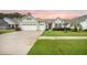 Charming one-story home featuring a two-car garage and well-manicured lawn at 331 Fish Creek Ct, Summerville, SC 29486