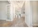 Bright and open hallway featuring elegant flooring and stylish light fixtures at 331 Fish Creek Ct, Summerville, SC 29486