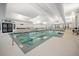 Bright and spacious indoor pool with multiple lanes, natural lighting, and comfortable seating at 331 Fish Creek Ct, Summerville, SC 29486