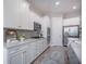 Modern kitchen featuring stainless steel appliances, white cabinets, and lots of counter space at 331 Fish Creek Ct, Summerville, SC 29486
