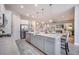 Open-concept kitchen featuring a large island, stainless steel appliances, and sightlines to the living room at 331 Fish Creek Ct, Summerville, SC 29486