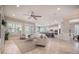 Bright and open living room with a ceiling fan and seamless flow to other areas at 331 Fish Creek Ct, Summerville, SC 29486