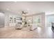 Spacious living room featuring built-in bookshelves, a fireplace, and ample seating at 331 Fish Creek Ct, Summerville, SC 29486