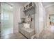 Functional mudroom with custom built-ins, storage, and a convenient bench at 331 Fish Creek Ct, Summerville, SC 29486