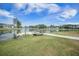 Picturesque pond area with a floating dock perfect for fishing, surrounded by meticulously maintained grounds at 331 Fish Creek Ct, Summerville, SC 29486