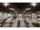 Well-equipped gym with weight benches, yoga mats, and cardio machines at 365 Trailmore Ln, Summerville, SC 29486