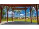 Scenic shot through covered structure with neighborhood and trees in background at 365 Trailmore Ln, Summerville, SC 29486