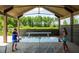 Outdoor recreation area featuring ping pong tables and a covered play area for residents and their guests at 365 Trailmore Ln, Summerville, SC 29486