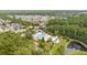 Aerial view showcasing community pool, amenity center, and surrounding neighborhood at 3726 Orion Ln, Mount Pleasant, SC 29466
