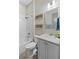 Bright bathroom with white subway tile shower and vanity with granite countertop, toilet, and accent décor at 3726 Orion Ln, Mount Pleasant, SC 29466