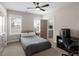 Neutrally decorated bedroom with abundant natural light, a modern desk and chair, and attached bath at 3726 Orion Ln, Mount Pleasant, SC 29466