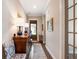 Welcoming hallway with hardwood floors, a console table and a view to the front door at 3726 Orion Ln, Mount Pleasant, SC 29466