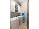 Functional laundry room with overhead cabinets and modern appliances at 3726 Orion Ln, Mount Pleasant, SC 29466