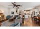 Open concept living area with hardwood floors and views to the dining and kitchen at 3726 Orion Ln, Mount Pleasant, SC 29466