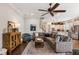 Inviting living room with stylish decor, hardwood floors, and an open layout connecting to the kitchen at 3726 Orion Ln, Mount Pleasant, SC 29466